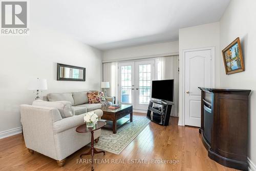 307 - 200 Collier Street, Barrie, ON - Indoor Photo Showing Living Room