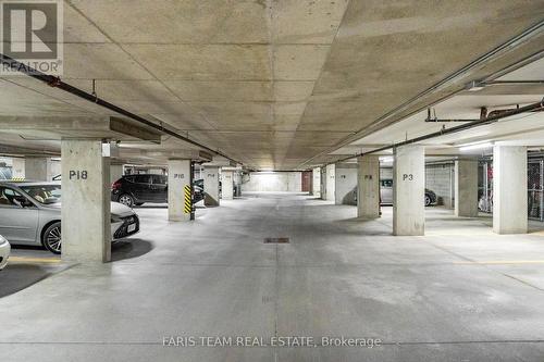 307 - 200 Collier Street, Barrie, ON - Indoor Photo Showing Garage