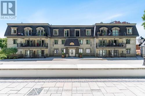 307 - 200 Collier Street, Barrie, ON - Outdoor With Balcony With Facade