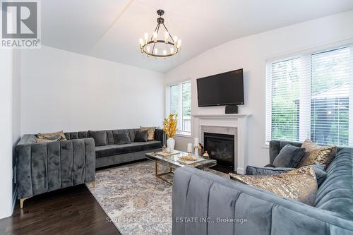 9 Upper Canada Court N, Halton Hills, ON - Indoor Photo Showing Living Room With Fireplace