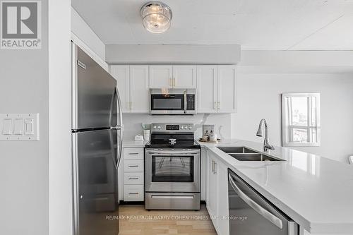 Ph 803 - 800 King Street W, Toronto, ON - Indoor Photo Showing Kitchen With Double Sink