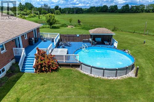 40 Station Road, Kawartha Lakes, ON - Outdoor With Above Ground Pool With Deck Patio Veranda