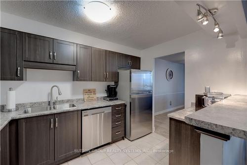 323 Colborne Street|Unit #1004, London, ON - Indoor Photo Showing Kitchen With Double Sink