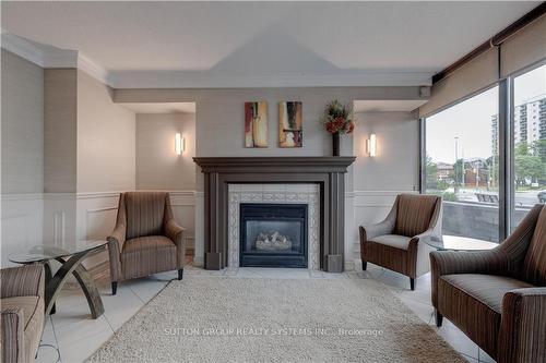 323 Colborne Street|Unit #1004, London, ON - Indoor Photo Showing Living Room With Fireplace