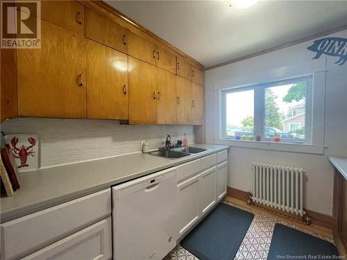 12 Pettes Cove Road, Grand Manan, NB - Indoor Photo Showing Kitchen With Double Sink