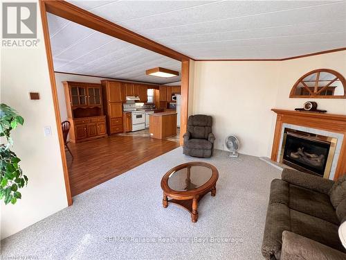 49 Cherokee Lane, Ashfield-Colborne-Wawanosh (Colborne Twp), ON - Indoor Photo Showing Living Room With Fireplace