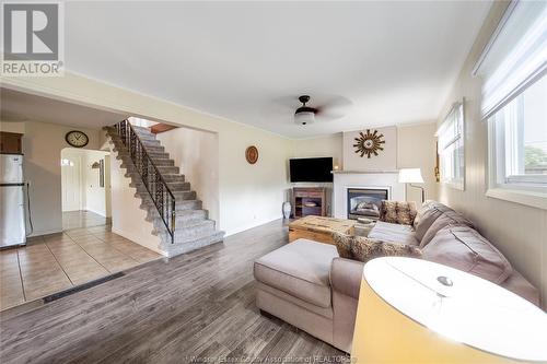 2714 Lloyd George, Windsor, ON - Indoor Photo Showing Living Room With Fireplace