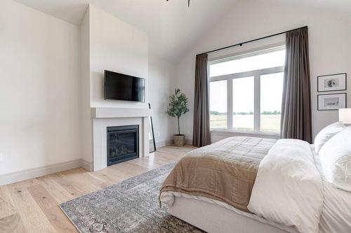 3417 Tyneside Road, Glanbrook, ON - Indoor Photo Showing Bedroom With Fireplace