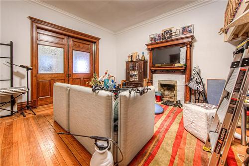 171 Bay Street S, Hamilton, ON - Indoor With Fireplace