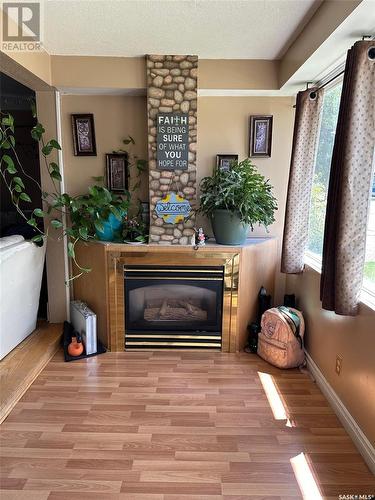 921 3Rd Street, Estevan, SK - Indoor Photo Showing Other Room With Fireplace