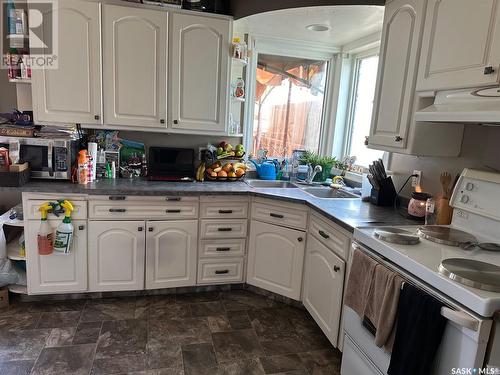 921 3Rd Street, Estevan, SK - Indoor Photo Showing Kitchen With Double Sink