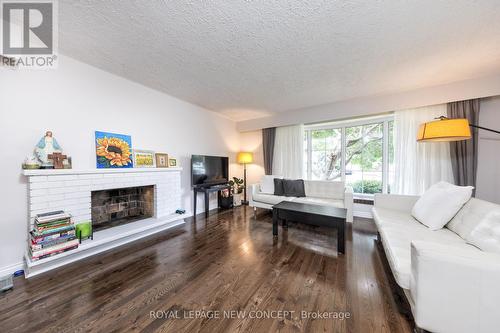 15 Arbroath Crescent, Toronto, ON - Indoor Photo Showing Living Room With Fireplace