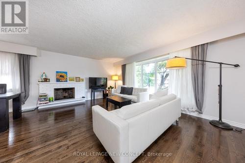 15 Arbroath Crescent, Toronto, ON - Indoor Photo Showing Living Room With Fireplace