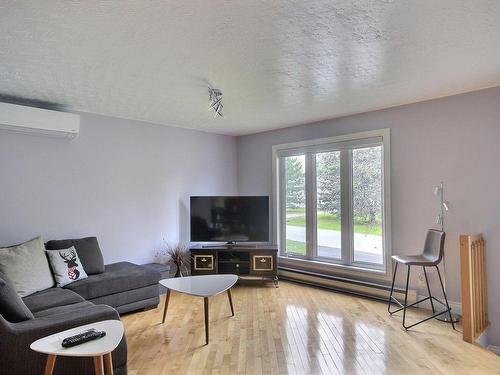 Living room - 208 Rue Des Outardes, Rouyn-Noranda, QC 