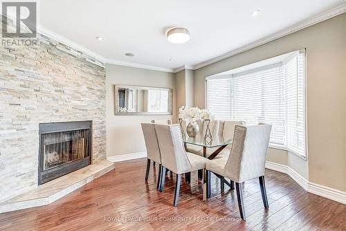 5231 Astwell Avenue, Mississauga, ON - Indoor Photo Showing Dining Room With Fireplace