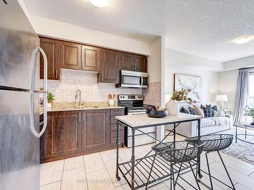 205-886 Golf Links Rd, Hamilton, ON - Indoor Photo Showing Kitchen With Stainless Steel Kitchen