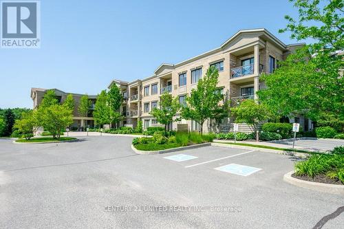 209 - 869 Clonsilla Avenue, Peterborough, ON - Outdoor With Balcony With Facade