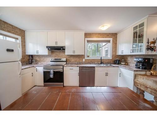 8773 Tamarack Street, Canal Flats, BC - Indoor Photo Showing Kitchen With Double Sink