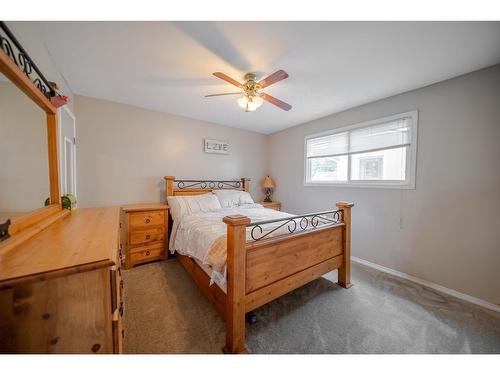 8773 Tamarack Street, Canal Flats, BC - Indoor Photo Showing Bedroom