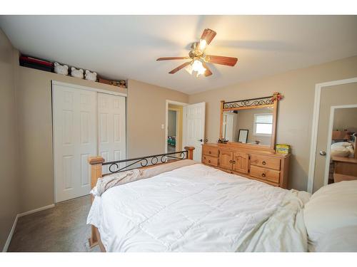 8773 Tamarack Street, Canal Flats, BC - Indoor Photo Showing Bedroom