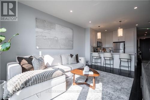 409 - 101 Locke Street, Hamilton, ON - Indoor Photo Showing Living Room