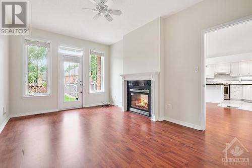 Primary bedroom with fireplace - 16 Morenz Terrace, Ottawa, ON - Indoor Photo Showing Living Room With Fireplace