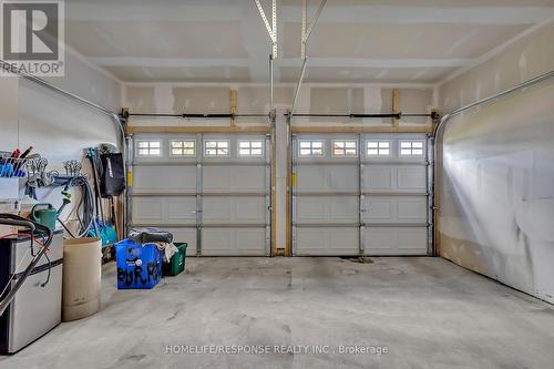 3 Burrows Court W, Kawartha Lakes (Lindsay), ON - Indoor Photo Showing Garage