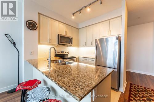 2110 - 3975 Grand Park Drive, Mississauga, ON - Indoor Photo Showing Kitchen With Stainless Steel Kitchen With Double Sink