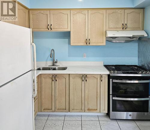 29 Centrepark Drive, Toronto, ON - Indoor Photo Showing Kitchen With Double Sink