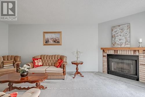 1136 Mccraney Street E, Oakville, ON - Indoor Photo Showing Living Room With Fireplace