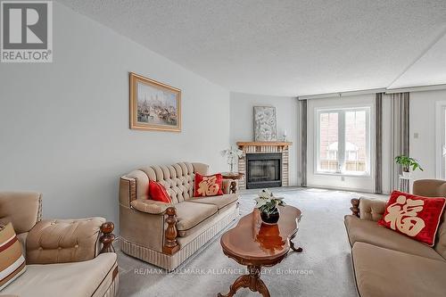 1136 Mccraney Street E, Oakville, ON - Indoor Photo Showing Living Room With Fireplace