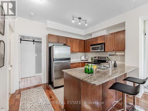 207 - 3504 Hurontario Street, Mississauga, ON - Indoor Photo Showing Kitchen With Stainless Steel Kitchen With Double Sink