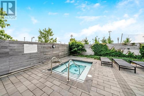 207 - 1050 Main Street E, Milton, ON - Outdoor With In Ground Pool