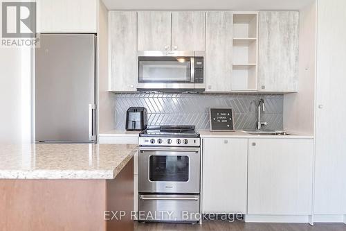 1007 - 251 Manitoba Street, Toronto, ON - Indoor Photo Showing Kitchen With Stainless Steel Kitchen