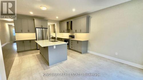 109 Bearberry Road, Springwater, ON - Indoor Photo Showing Kitchen With Double Sink