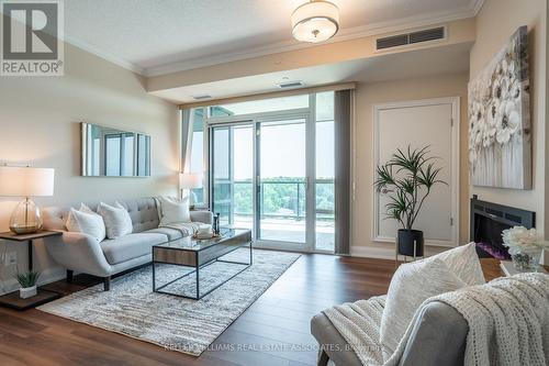 906 - 50 Hall Road, Halton Hills (Georgetown), ON - Indoor Photo Showing Living Room With Fireplace