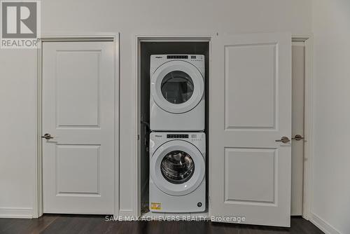 921 - 8 Nahani Way, Mississauga, ON - Indoor Photo Showing Laundry Room