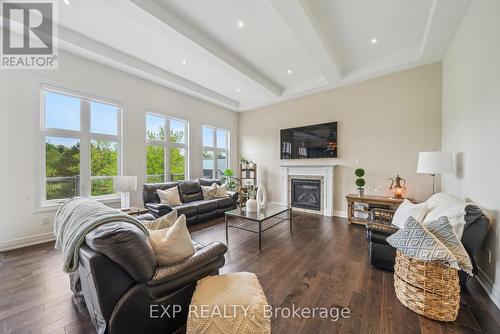57 Hogan Court, King, ON - Indoor Photo Showing Living Room With Fireplace