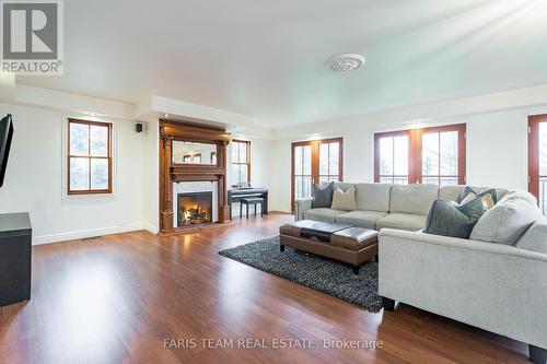 7001 County Road 27, Innisfil, ON - Indoor Photo Showing Living Room With Fireplace