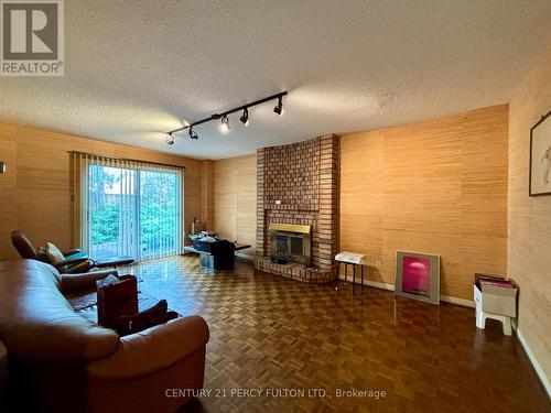 10 Strawberry Hills Drive, Toronto, ON - Indoor Photo Showing Living Room With Fireplace
