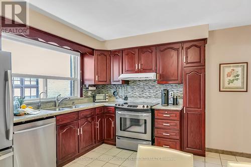 16 Whittaker Crescent, Toronto, ON - Indoor Photo Showing Kitchen With Stainless Steel Kitchen With Double Sink