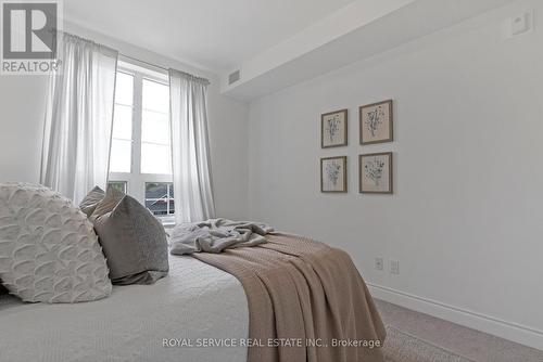 303 - 21 Brookhouse Drive, Clarington, ON - Indoor Photo Showing Bedroom