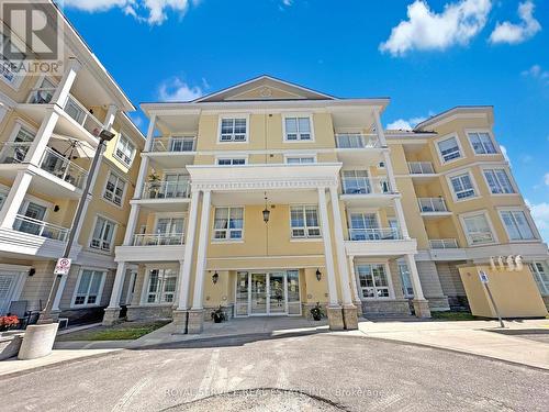 303 - 21 Brookhouse Drive, Clarington, ON - Outdoor With Balcony With Facade