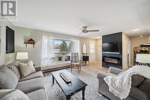 231 Lakeshore Drive, Kawartha Lakes, ON - Indoor Photo Showing Living Room With Fireplace