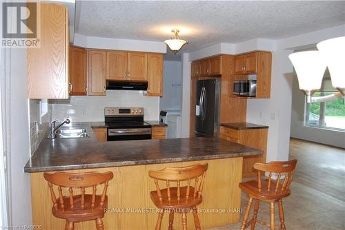 19 Allan Street W, Minto (Clifford), ON - Indoor Photo Showing Kitchen With Double Sink