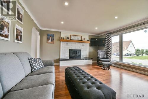 574 Eyre Blvd, Timmins, ON - Indoor Photo Showing Living Room With Fireplace