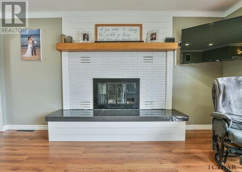 574 Eyre Blvd, Timmins, ON - Indoor Photo Showing Other Room With Fireplace