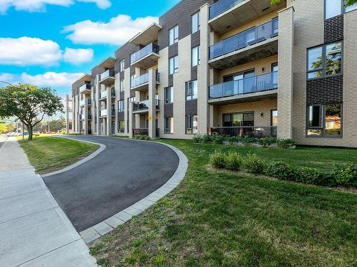 Frontage - 107-16 Rue Roger-Pilon, Dollard-Des-Ormeaux, QC - Outdoor With Balcony With Facade