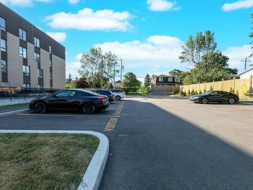 Parking - 107-16 Rue Roger-Pilon, Dollard-Des-Ormeaux, QC - Outdoor