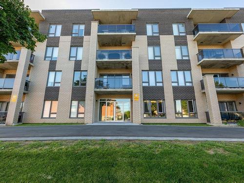 Frontage - 107-16 Rue Roger-Pilon, Dollard-Des-Ormeaux, QC - Outdoor With Balcony With Facade